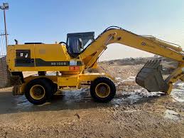بیل مکانیکی هپکو اچ 100 چرخ لاستیکی اماده به کار